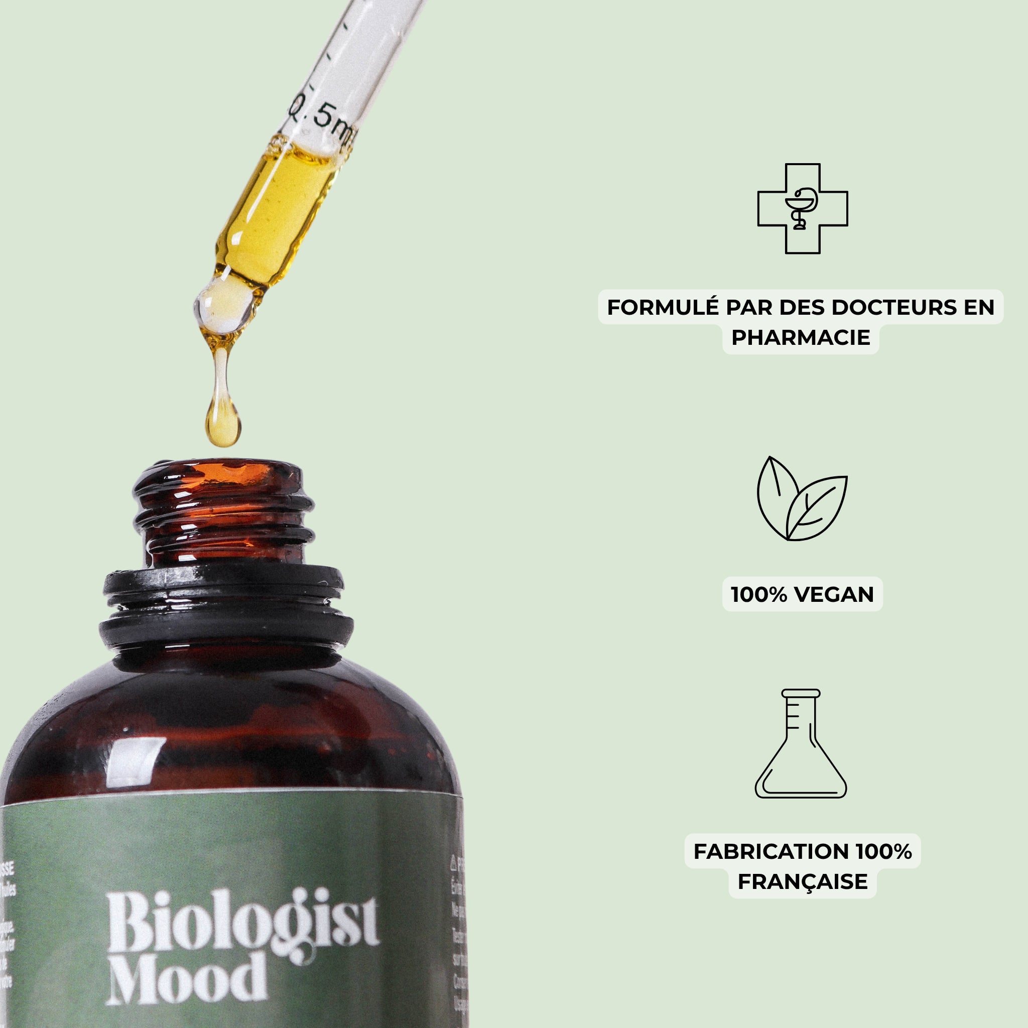 Application de l’huile capillaire Biologist Mood avec pipette compte-gouttes, formule naturelle 100 % vegan pour renforcer la fibre et stimuler la pousse.