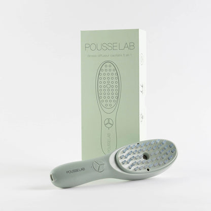 Brosse capillaire 5 en 1 PousseLab avec picots massants, luminothérapie rouge et bleue, nano-ionisation et diffuseur de sérum pour stimuler la pousse des cheveux et améliorer la circulation du cuir chevelu.
