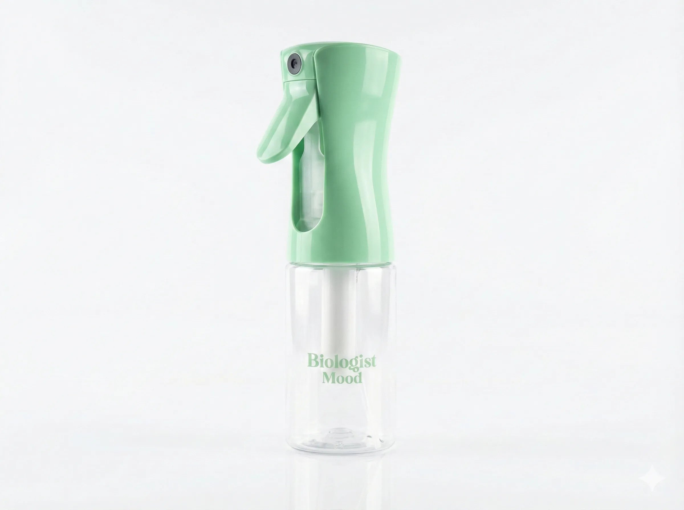 Vaporisateur pour cheveux Biologist Mood vert pastel avec flacon transparent, conçu pour une pulvérisation fine et uniforme des soins capillaires